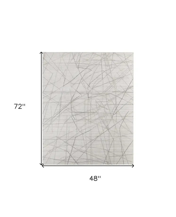 4' X 6' Gray and Ivory Abstract Hand Woven Area Rug