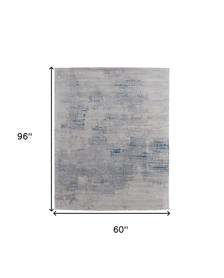 5' X 8' Gray Taupe and Blue Abstract Hand Tufted Area Rug