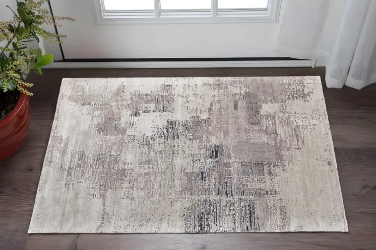 2' X 3' Brown Black and Tan Abstract Hand Tufted Area Rug