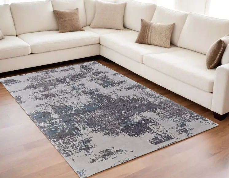 5' X 8' Ivory Brown and Blue Abstract Hand Tufted Area Rug