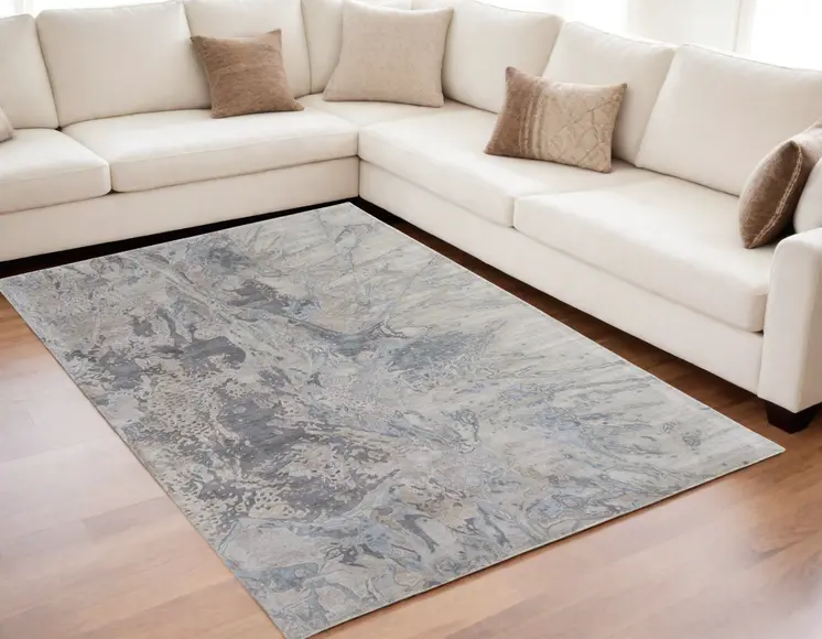 5' X 8' Gray Tan and Green Abstract Hand Tufted Worn Faded Area Rug