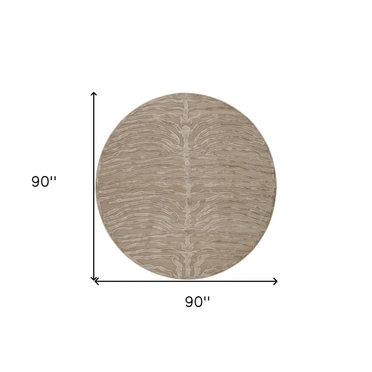 8' Tan and Ivory Animal Print Power Loom Round Rug