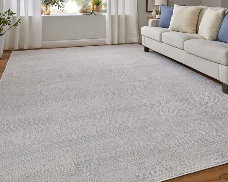 2' X 3' Ivory and Silver Abstract Power Loom Worn Faded Area Rug