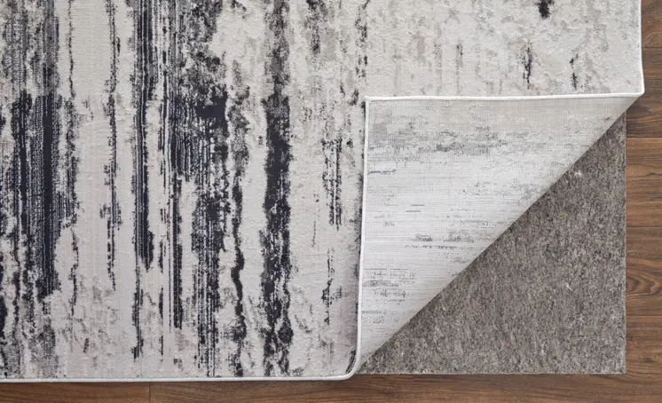 2' X 3' Ivory and Gray Abstract Power Loom Worn Faded Area Rug