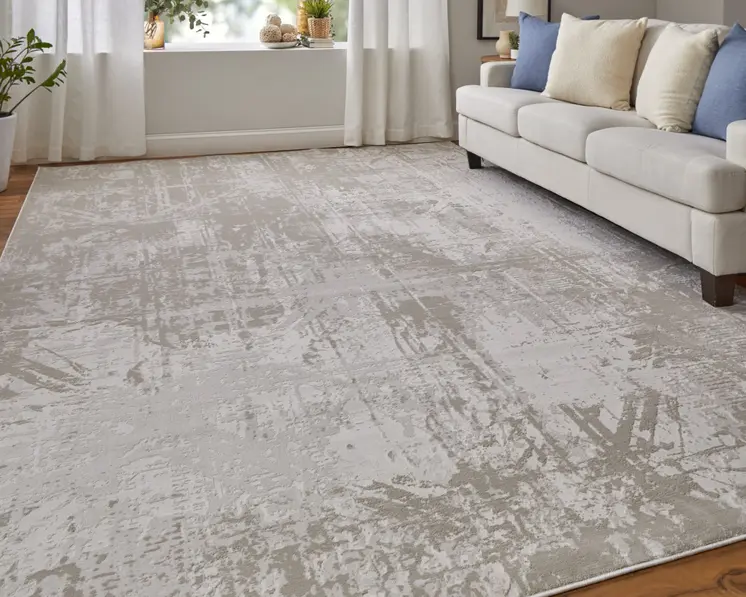 2' X 3' Ivory and Silver Abstract Power Loom Worn Faded Area Rug