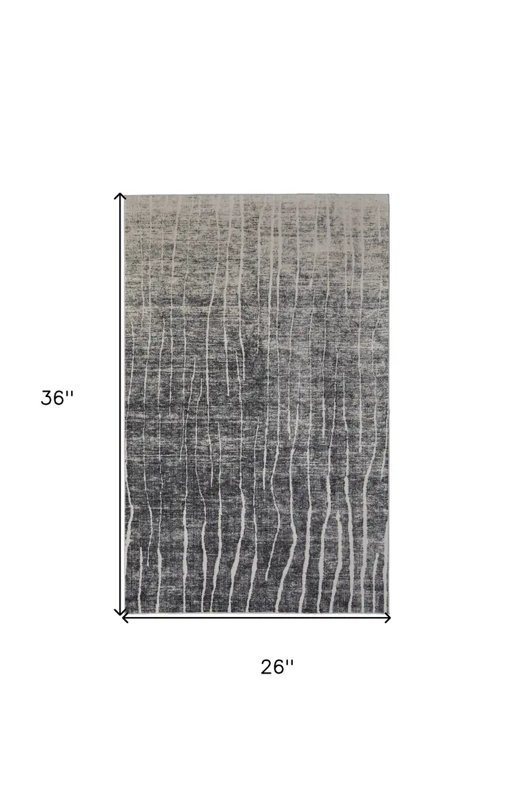 2' X 3' Black Gray and Ivory Abstract Power Loom Area Rug