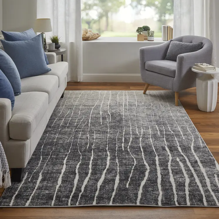 2' X 3' Black Gray and Ivory Abstract Power Loom Area Rug
