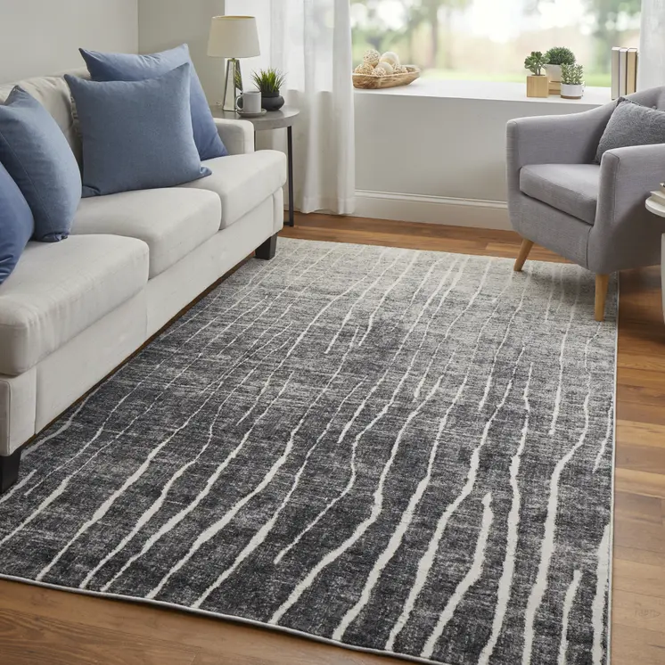 2' X 3' Black Gray and Ivory Abstract Power Loom Area Rug