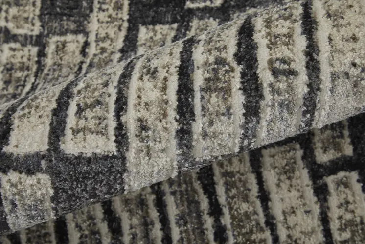 2' X 3' Gray Black and Ivory Geometric Power Loom Worn Faded Area Rug