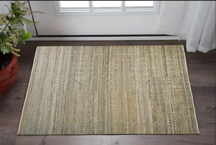 2' X 3' Ivory Gold and Tan Geometric Hand Knotted Worn Faded Area Rug