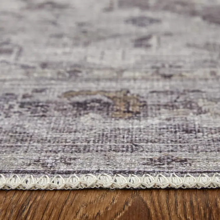 2' X 3' Gray and Ivory Oriental Power Loom Worn Faded Washable Area Rug
