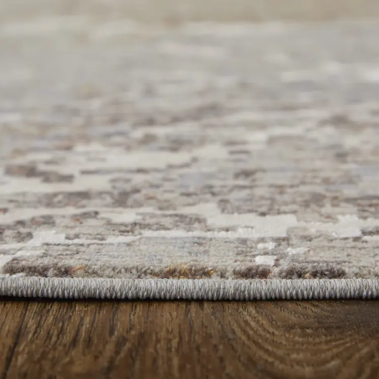 2' X 3' Taupe Brown and Ivory Abstract Power Loom Area Rug