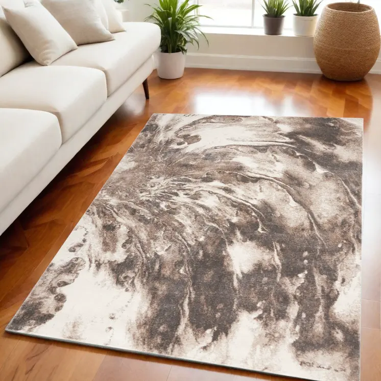 5' X 7' Tan Abstract Power Loom Area Rug