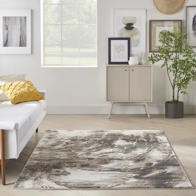 5' X 7' Tan Abstract Power Loom Area Rug