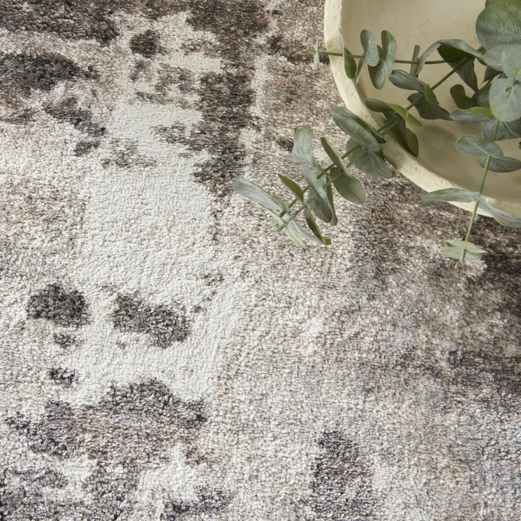 5' X 7' Tan Abstract Power Loom Area Rug