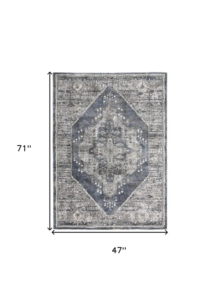 4' X 6' Blue Floral Power Loom Distressed Area Rug