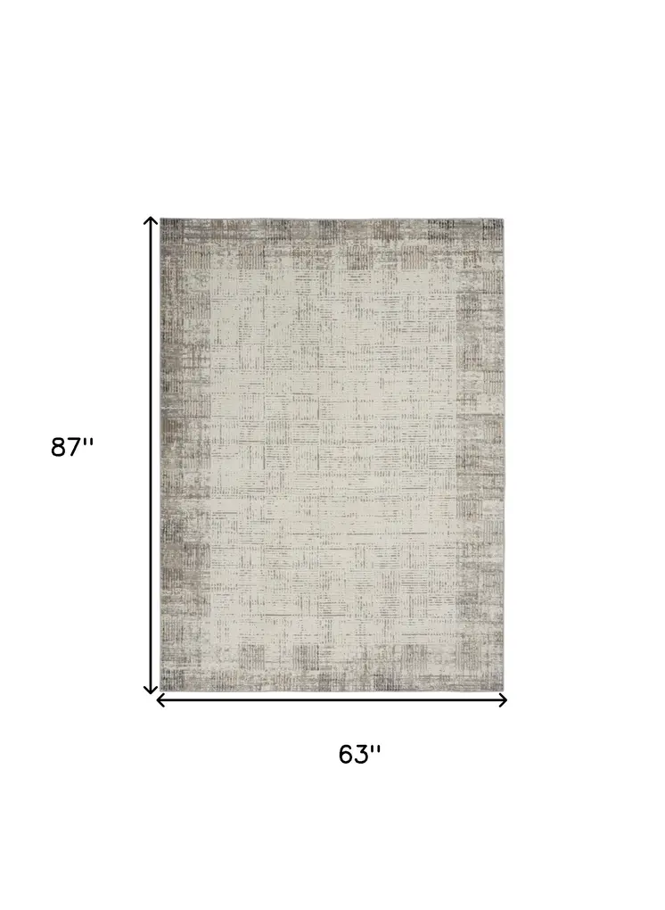 5' X 7' Ivory and Gray Abstract Area Rug