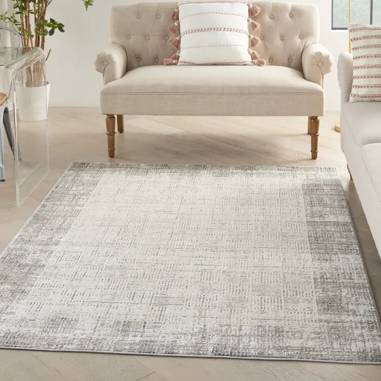 5' X 7' Ivory and Gray Abstract Area Rug