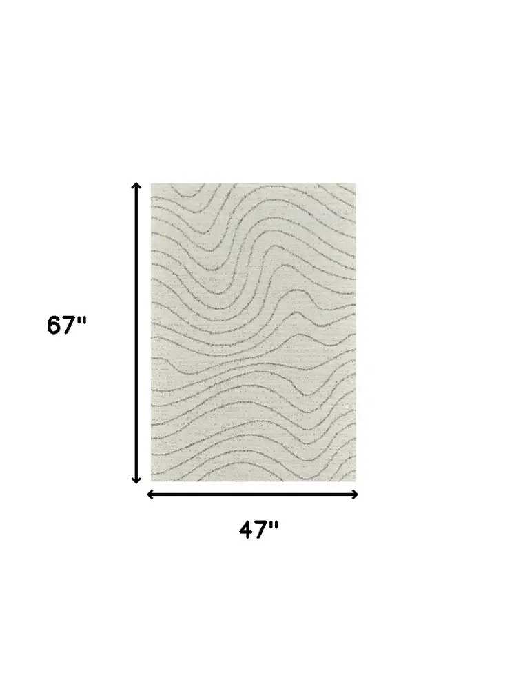 4' X 6' Cream and Beige Abstract Area Rug