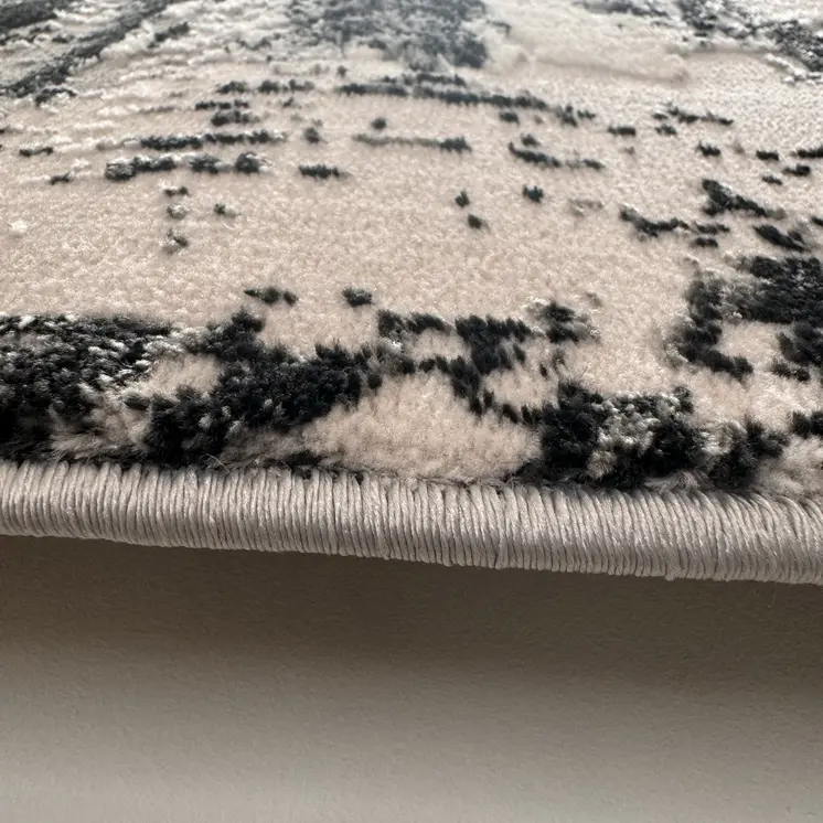 4' X 6' Black Gray and Beige Abstract Area Rug