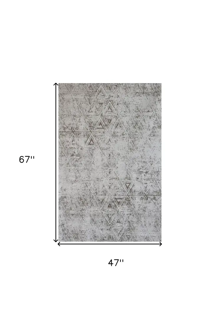 4' X 6' Cream and Beige Abstract Area Rug