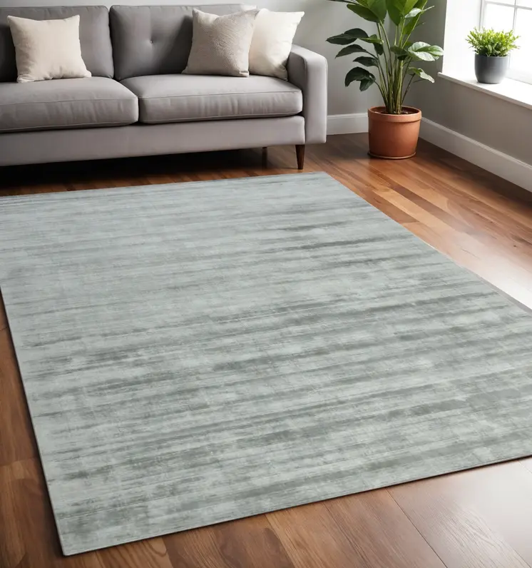 5' X 8' Silver And Gray Abstract Hand Woven Area Rug