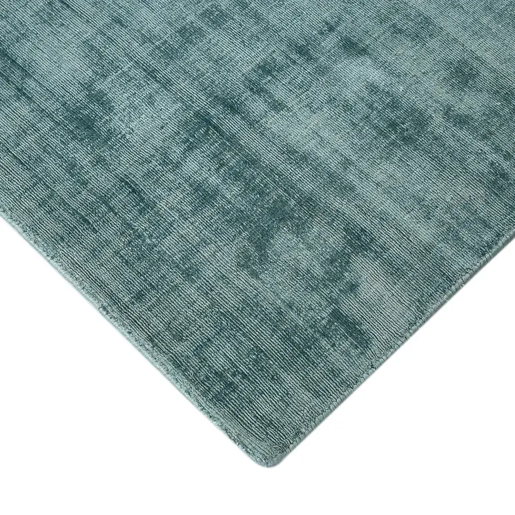 5' X 8' Sea Green And Light Blue Abstract Hand Woven Area Rug