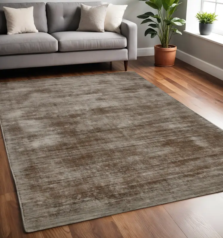 5' X 8' Brown And Gray Abstract Hand Woven Area Rug