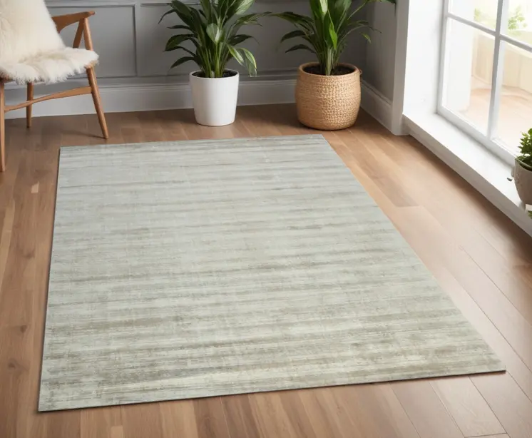 4' X 6' Ivory And Gray Abstract Hand Woven Area Rug