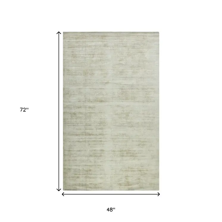 4' X 6' Sand And Ivory Abstract Hand Woven Area Rug