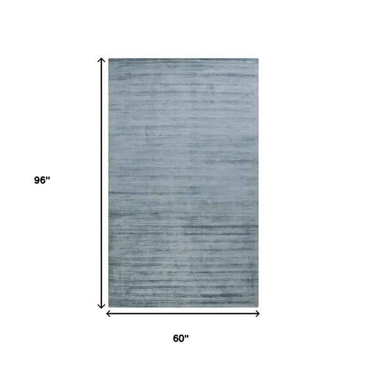 5' X 8' Light Blue And Dark Blue Striped Hand Woven Area Rug