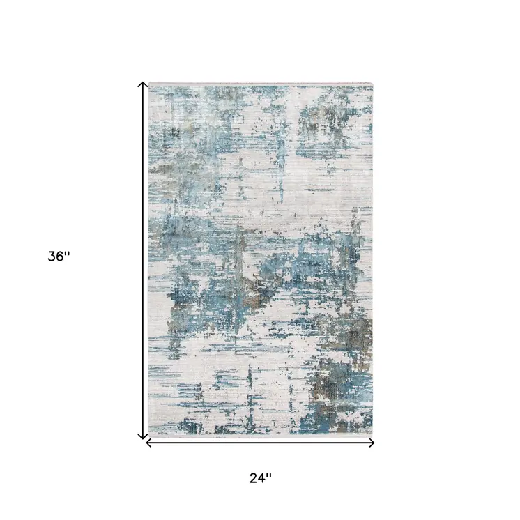 2' X 3' Ivory Blue And Brown Abstract Area Rug With Fringe