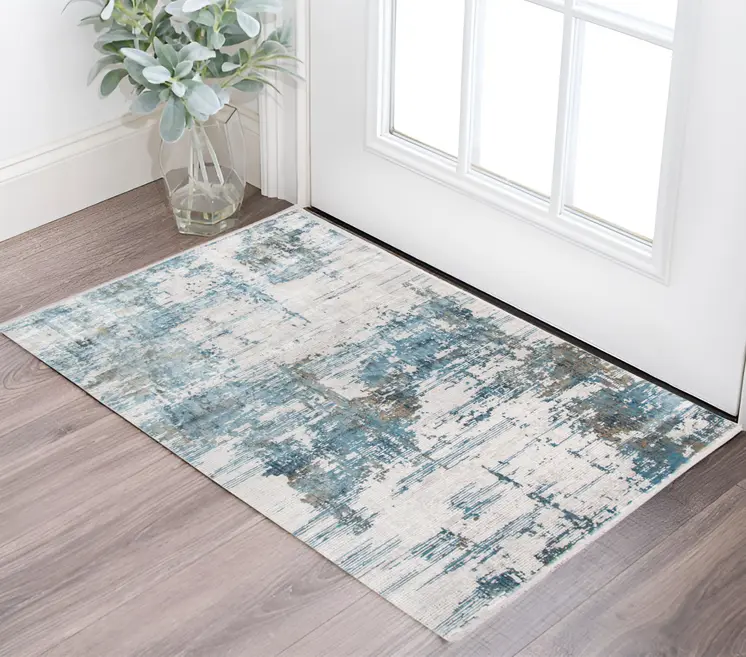 2' X 3' Ivory Blue And Brown Abstract Area Rug With Fringe