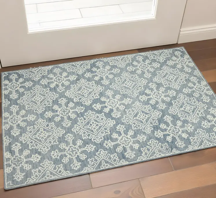 2' X 3' Sky Blue And Ivory Wool Oriental Hand Hooked Area Rug