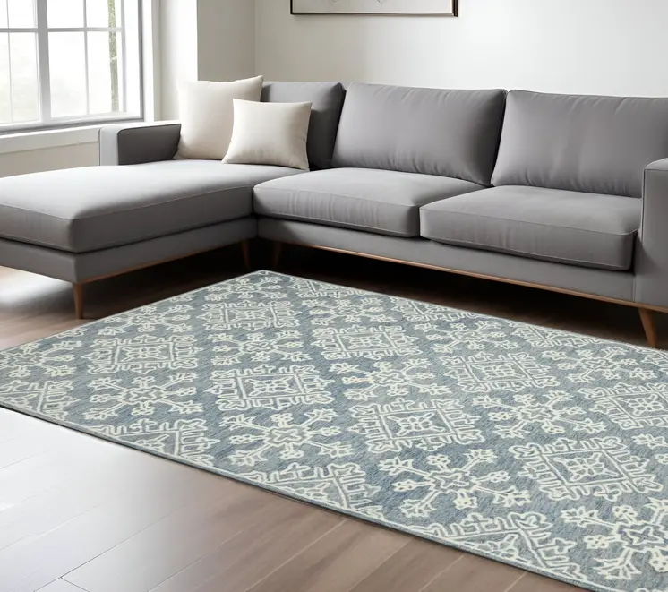 8' X 10' Sky Blue And Ivory Wool Oriental Hand Hooked Area Rug
