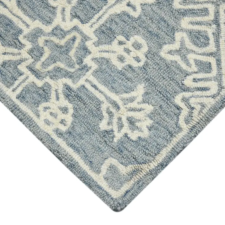 8' X 10' Sky Blue And Ivory Wool Oriental Hand Hooked Area Rug