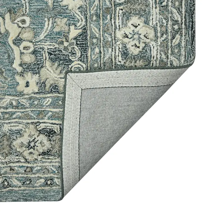 5' X 7' Sky Blue Gray And Ivory Wool Oriental Hand Tufted Area Rug