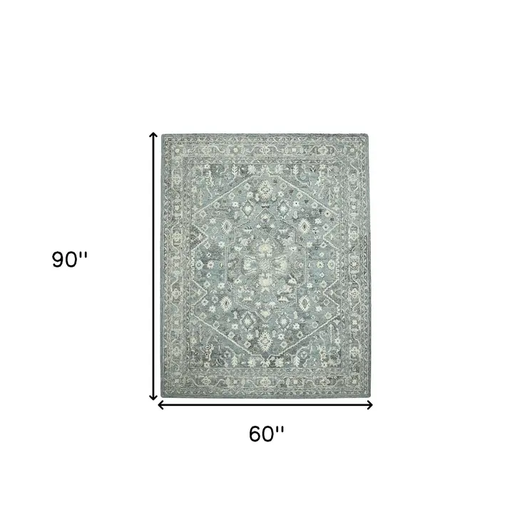 5' X 7' Sky Blue Gray And Ivory Wool Oriental Hand Tufted Area Rug