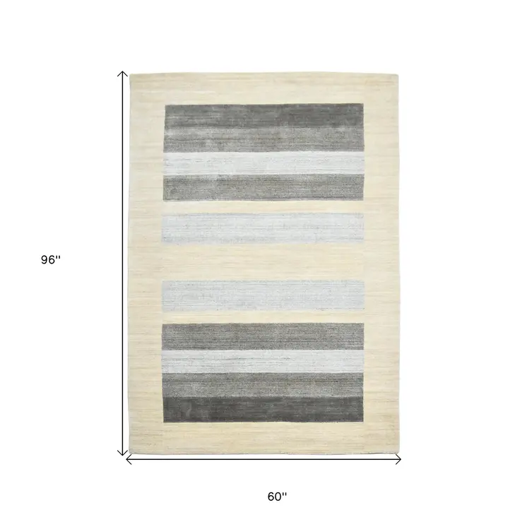 5' X 8' Ivory And Gray Wool Striped Hand Woven Area Rug