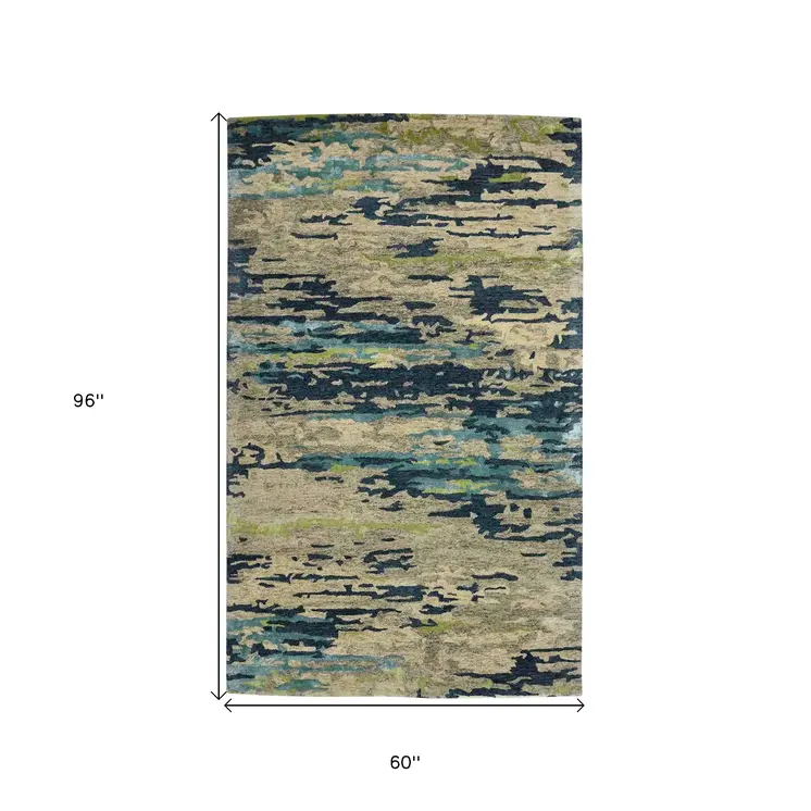 5' X 8' Sand And Green Wool Abstract Hand Tufted Area Rug