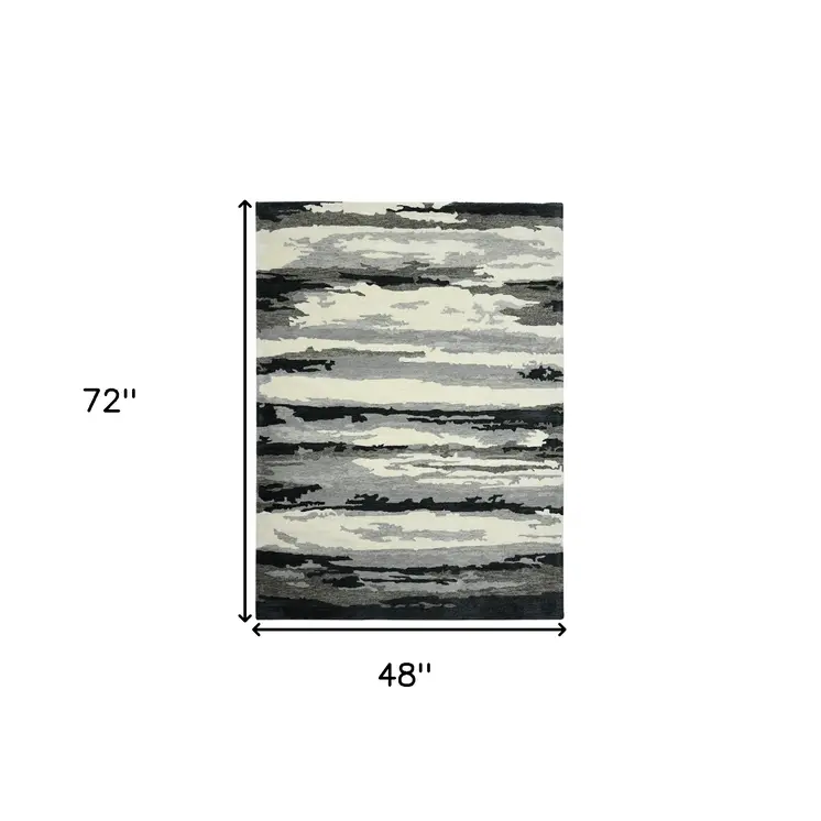 4' X 6' Dark Gray Black And Ivory Wool Abstract Hand Tufted Area Rug