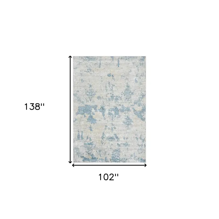 9' X 12' Ivory And Sky Blue Abstract Area Rug