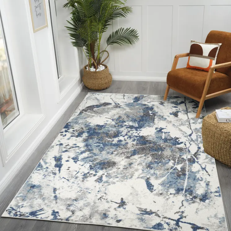 5' X 8' Ivory Teal And Black Abstract Area Rug