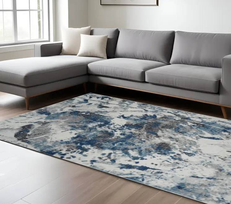 9' X 12' Ivory Teal And Black Abstract Area Rug