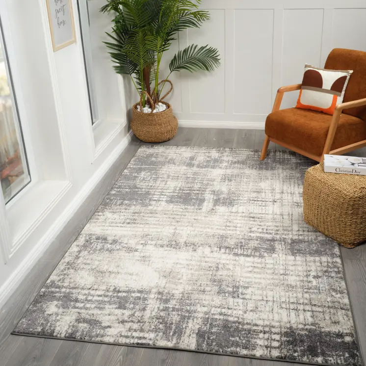 7' X 9' Gray And Ivory Abstract Area Rug