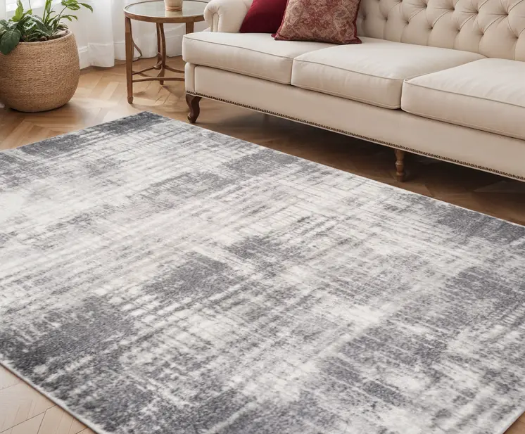 5' X 8' Cream And Gray Abstract Area Rug
