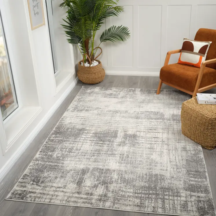 5' X 8' Cream And Gray Abstract Area Rug