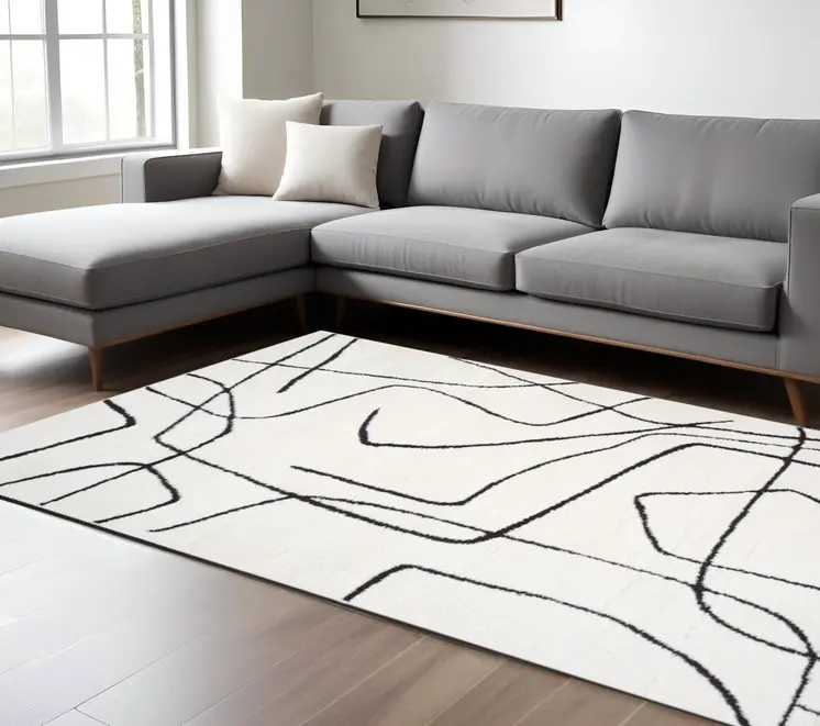 8' X 10' Ivory And Black Abstract Area Rug