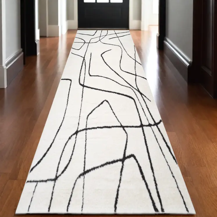 3' X 10' Ivory And Black Abstract Runner Rug