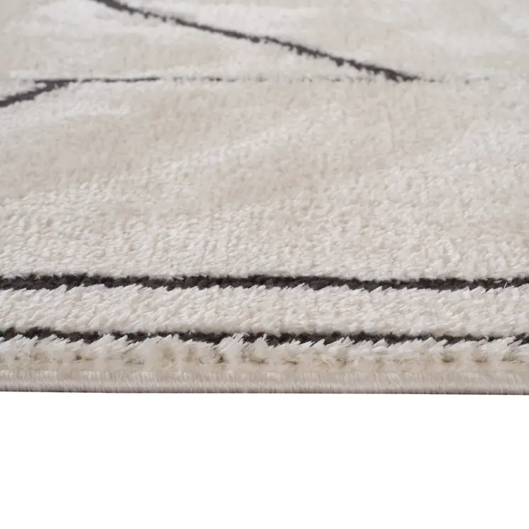5' X 7' Ivory And Black Geometric Area Rug